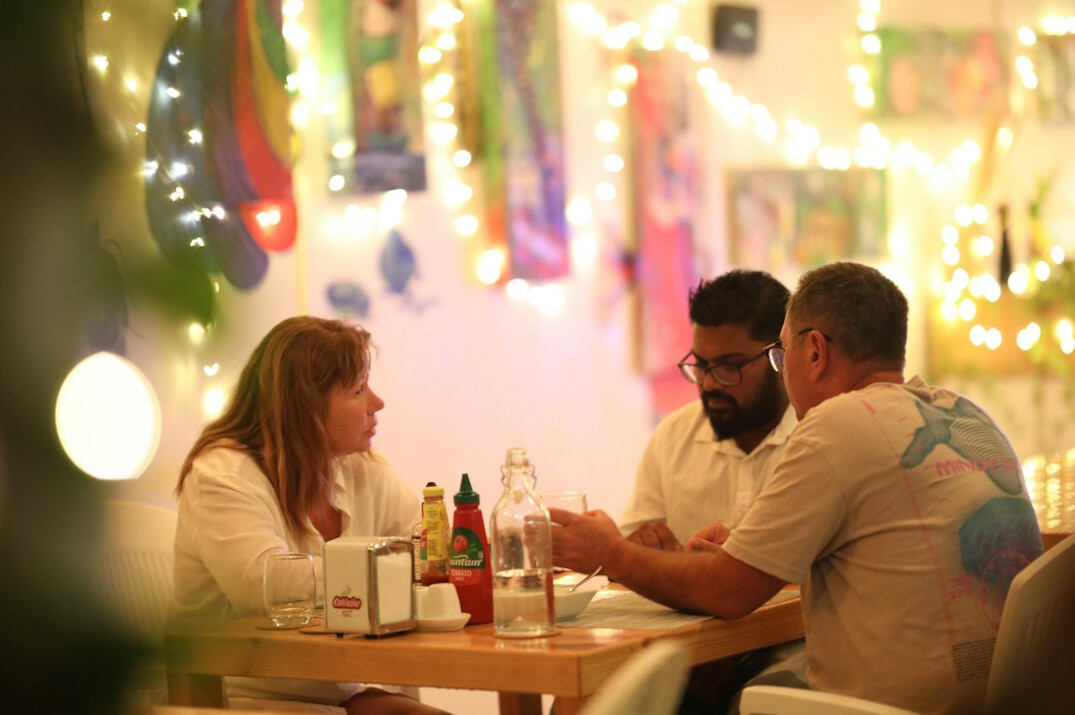 people discussing politics at table